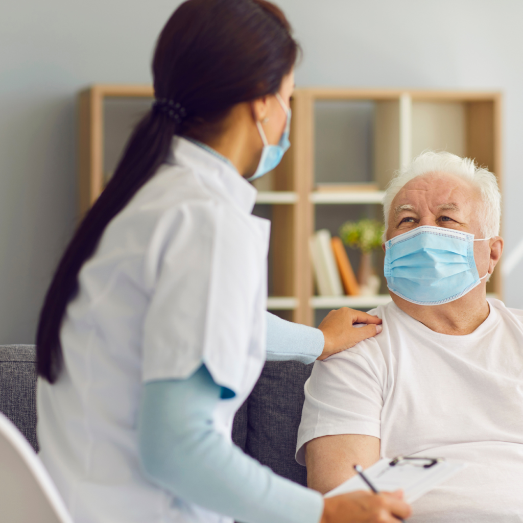 A health professional caring for a patient